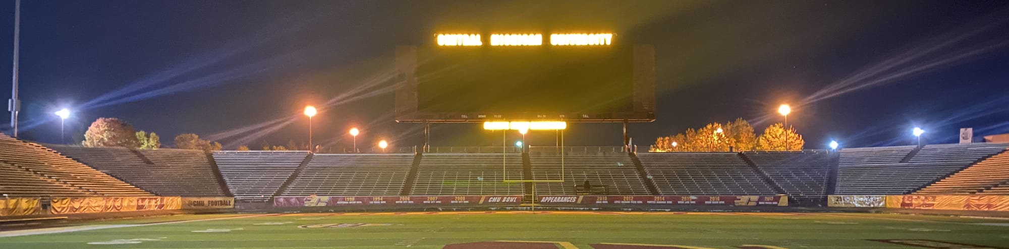 empty football stadium at night under the lights Durham