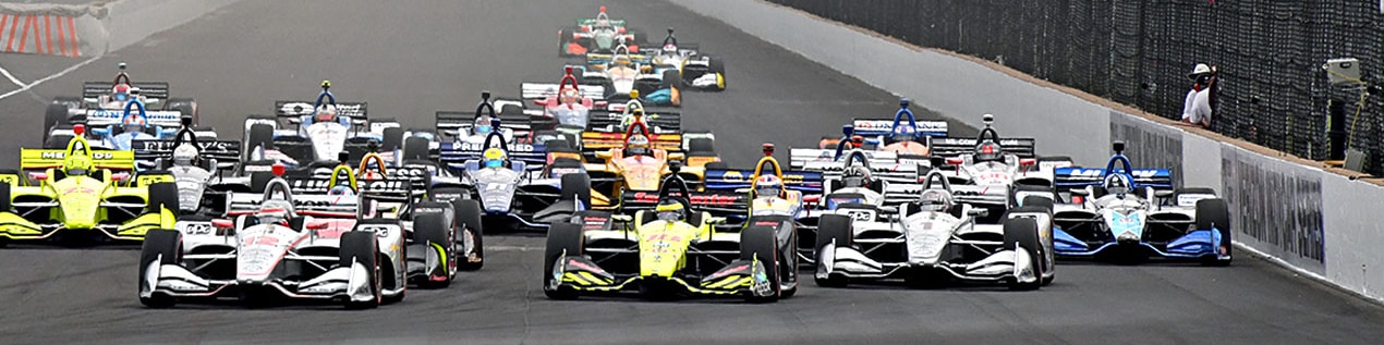 indy cars racing to through the start line Durham